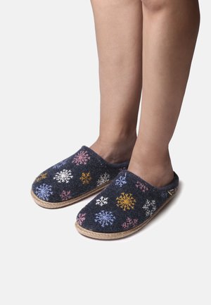 Wool slippers in dark navy with multi-colored snowflake embroidery. Soft texture, open back design, and natural fiber sole.