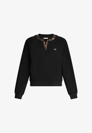 Czarna bluza z kapturem z kołnierzem w leoparda, zaprojektowana w dekolt w serek i z akcentem logo. Posiada długie rękawy i krótki krój. Miękka tekstura materiału.