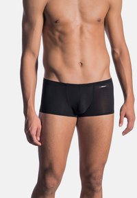 Boxer briefs neri realizzati in tessuto morbido, con un design aderente e un logo discreto. La vita è elastica per garantire comfort.