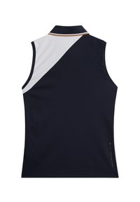 Ärmlös polo i marinblått och vitt, med en diagonal färgblockdesign, krage och en guldkant på sidan.