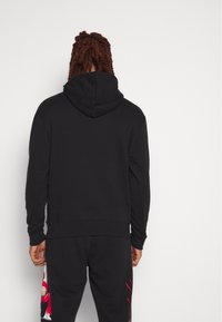 Jordan Felpa con cappuccio - black