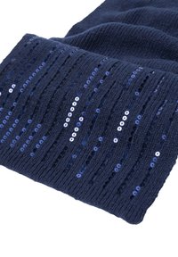 Tissu tricoté bleu marine avec des rangées verticales de paillettes bleu foncé brillantes cousues en lignes parallèles.