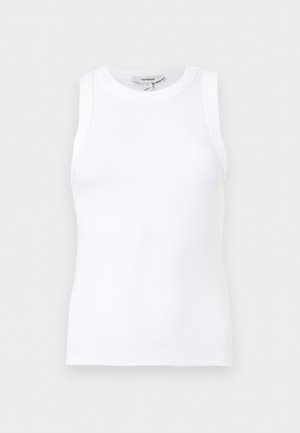 Valge ribidega varrukateta topp ümarate kaelusega, keha lähedane lõige ning väike brändisilt krae siseosas.