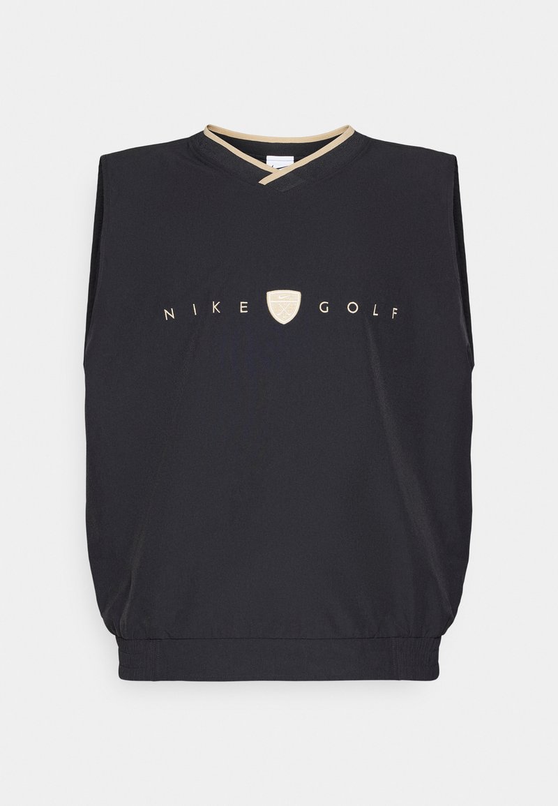 Haut sans manches Nike Golf noir avec un col en V, ornée d'un logo et d'un bord dorés. Texture lisse et ourlet inférieur élastique.