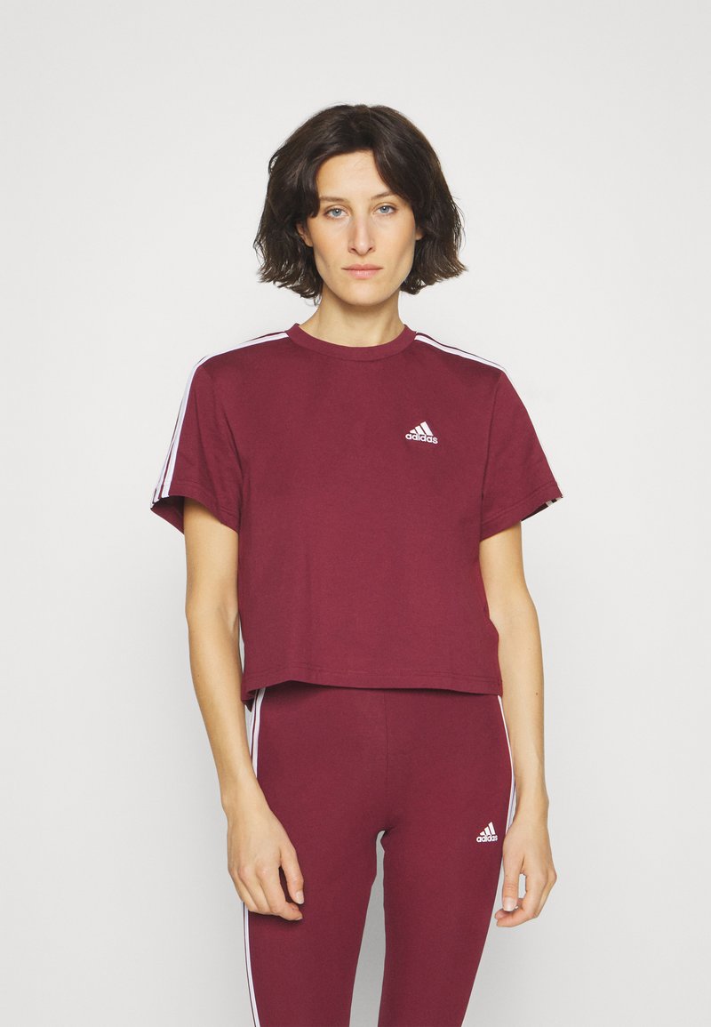 adidas Sportswear - ESSENTIALS STRIPES SINGLE CROPPED TOP - Apdrukāts T-krekls - shadow red/white, Palielināt