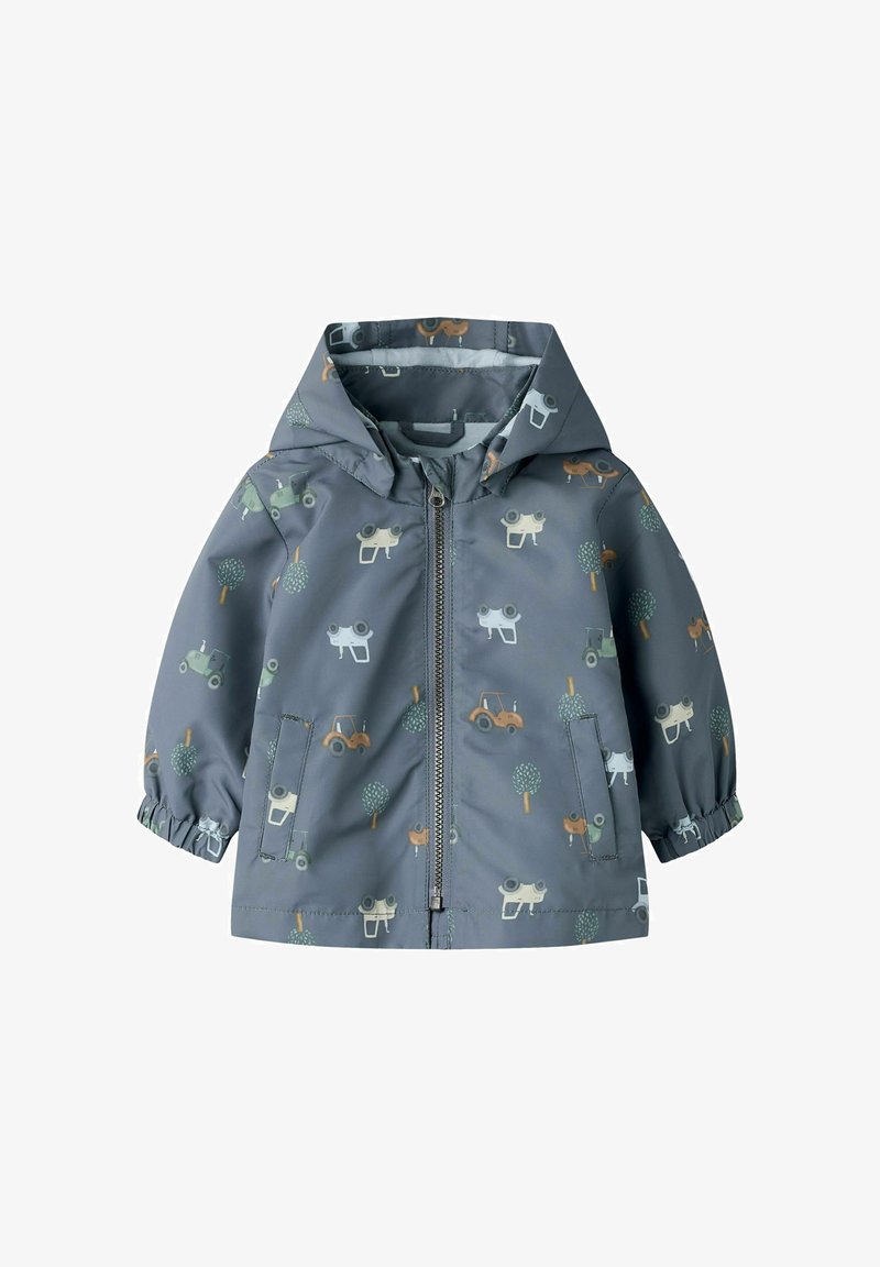 Veste à capuche grise pour enfant avec fermeture éclair à l'avant, poignets élastiques et un imprimé de tracteurs et d'arbres en vert doux, orange et blanc.