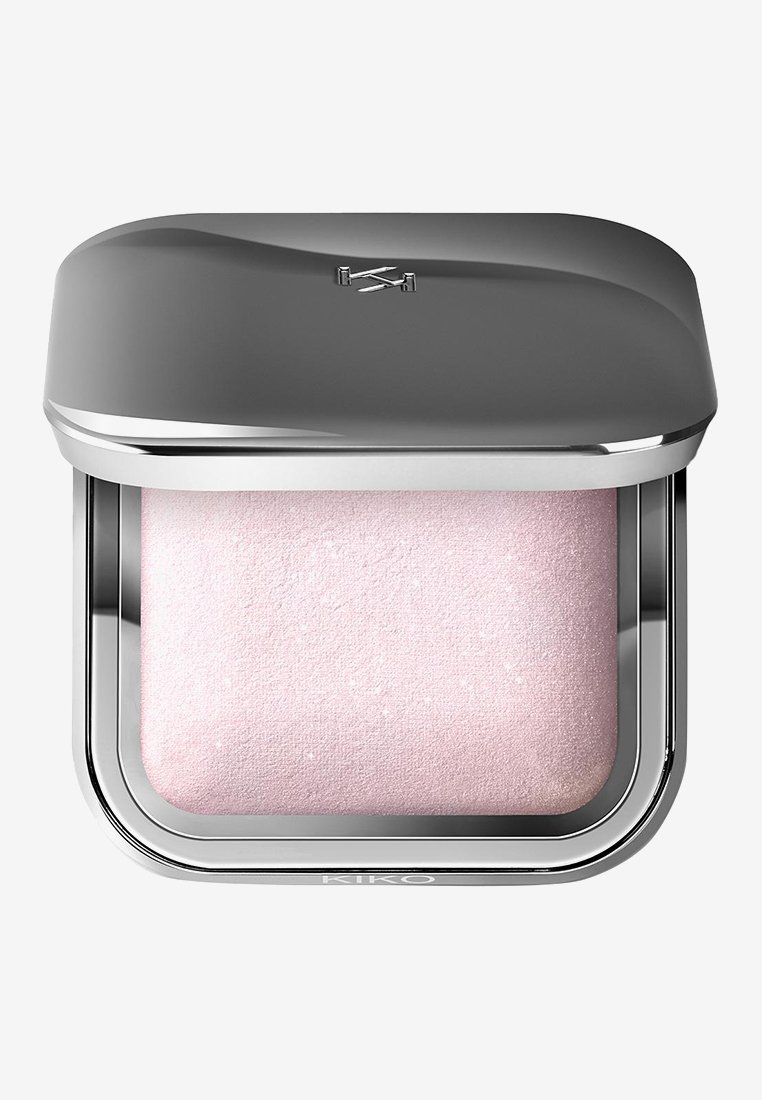 Compact case with a shiny silver lid partially open, revealing light pink shimmering pressed powder inside.