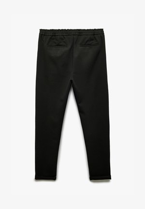 Pantalons noirs avec une taille élastique, deux poches arrière, coupe slim et poignets aux chevilles. Fabriqués en tissu lisse et extensible.
