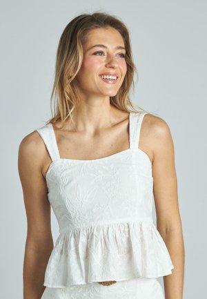 Weißes Peplum-Top mit quadratischem Ausschnitt und breiten Trägern. Verfügt über ein gesticktes Blumenmuster auf einem strukturierten Stoff.