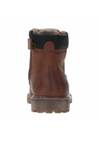 Braune Lederstiefelette mit strukturierter Oberfläche, Gummisohle und Fütterung aus Fell am oberen Rand, mit schwarzem Besatz und hinterem Riemen.