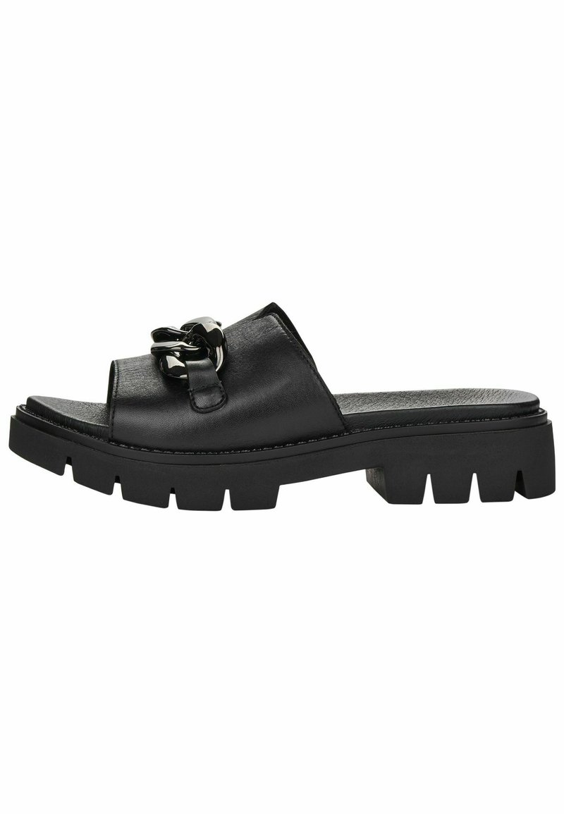Black leather slide-on sandals featuring a wide strap and a decorative chain accent, with a chunky textured sole for grip.