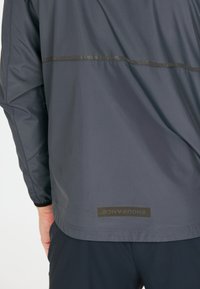 Endurance HUGOEE - Löparjacka - ombre blue