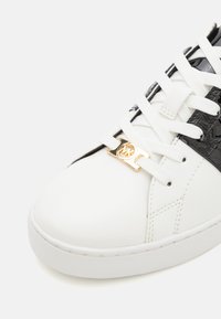 Michael Keaton Logo And Brushstroke Stripe Sneaker Michael Kors