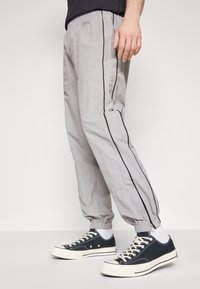 YOURTURN UNISEX - Spodnji deli trenirk - grey