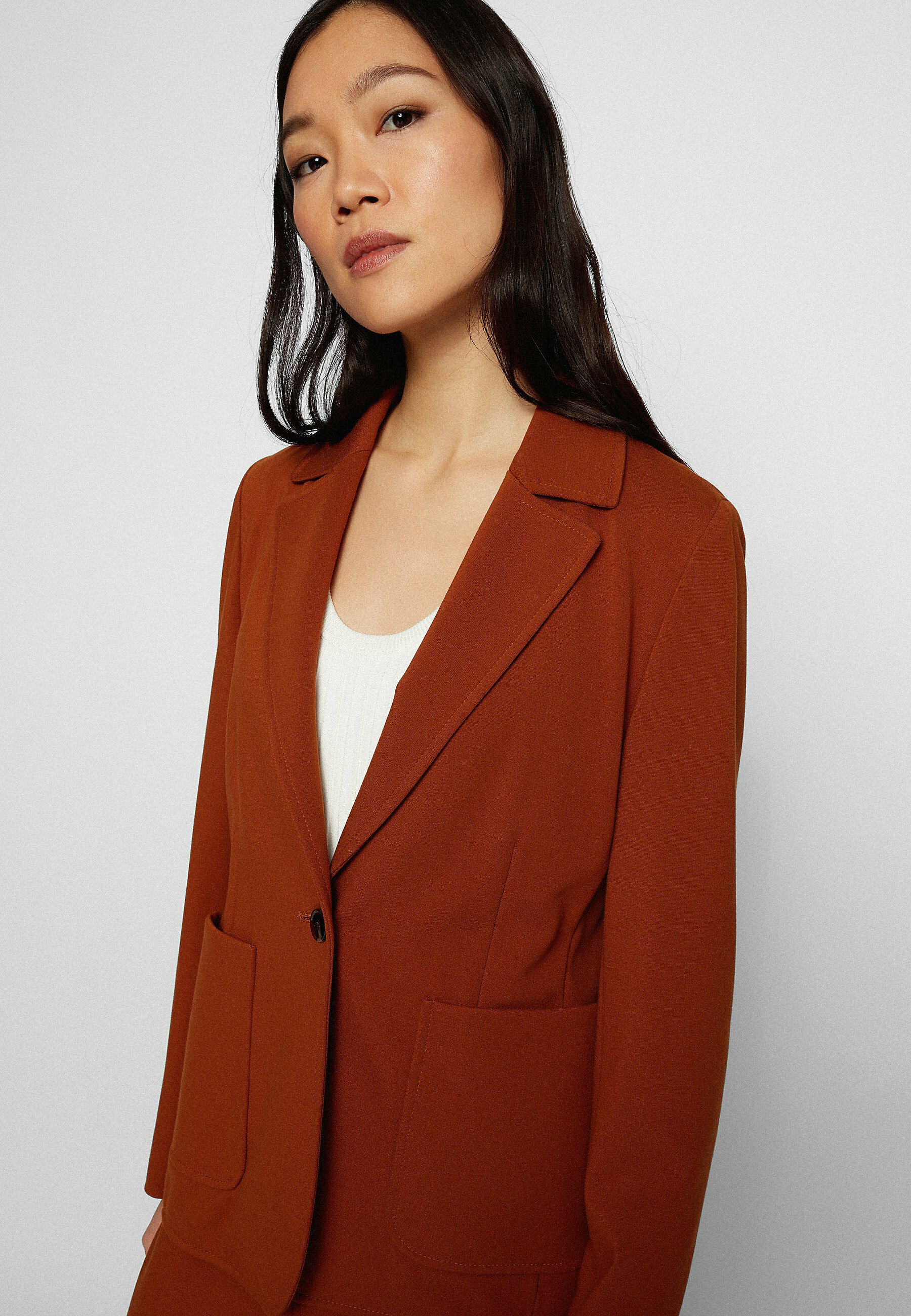 rust colored blazer