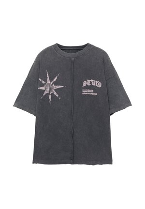Oversized black T-shirt made of cotton with short sleeves. Features a large compass graphic and text print in light color on the front.