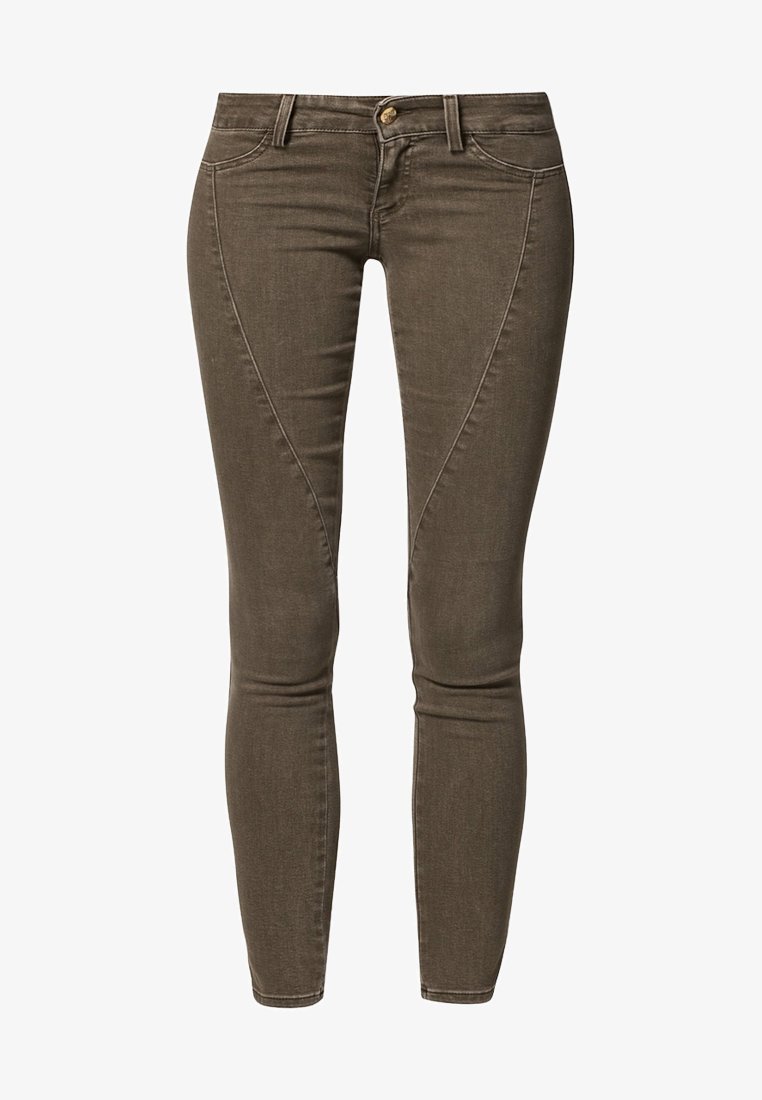 Jean skinny marron en denim texturé. Comprend une fermeture à bouton, cinq poches et des détails de coutures courbes le long des jambes.