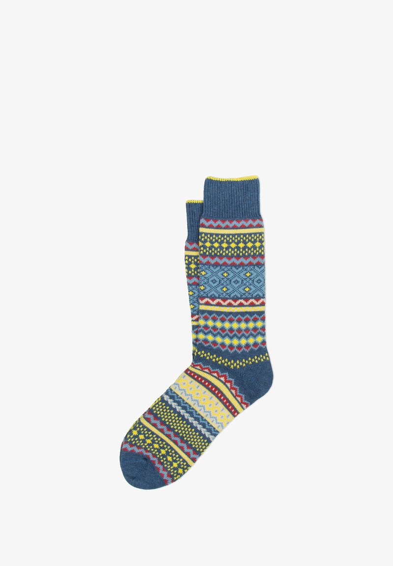 Calzini multicolori con base blu e motivi geometrici in giallo, rosso e bianco. Tessuto a maglia con polsini a coste.