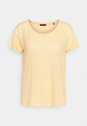 T-shirt jaune clair à manches courtes avec encolure ronde, texture de tissu douce, présenté sur un fond uni gris clair.