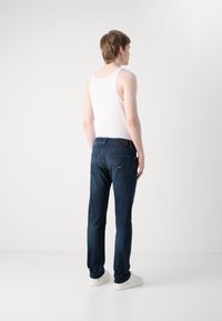 Tommy Jeans SCANTON SLIM - Slim fit jeans - denim dark