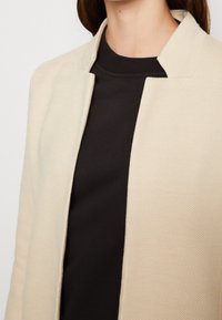 ONLY Abrigo corto - beige
