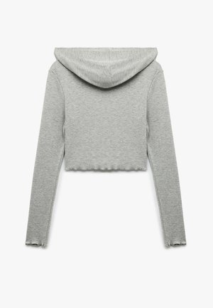 Grå cropped hoodie lavet af blødt stof med hætte, lange ærmer og en bølget kant. Simpelt, minimalistisk design uden yderligere grafik.