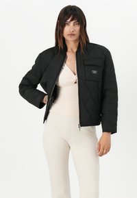 Guess Jeans QUILTED PUFFER JACKET - Bomber-jakk - jet black