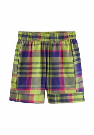 Luźne spodenki z elastycznym pasem w odważną kratę w kolorach zielonym, fioletowym, czerwonym i szarym.