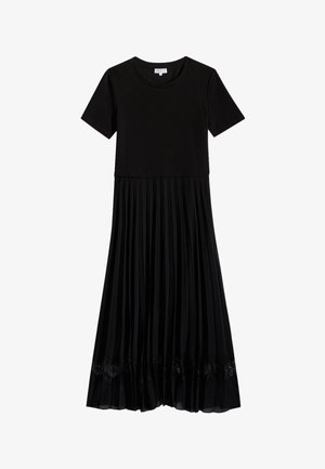 Un vestido negro que cuenta con una parte superior ajustada de mangas cortas y una falda plisada y fluida. El dobladillo inferior tiene un detalle decorativo de encaje.