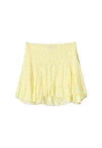 Gelber Spitzrock mit ausgestellt Design, der eine strukturierte Oberfläche und einen geschichteten Saum aufweist. Das leichte Material erzeugt ein fließendes Aussehen.