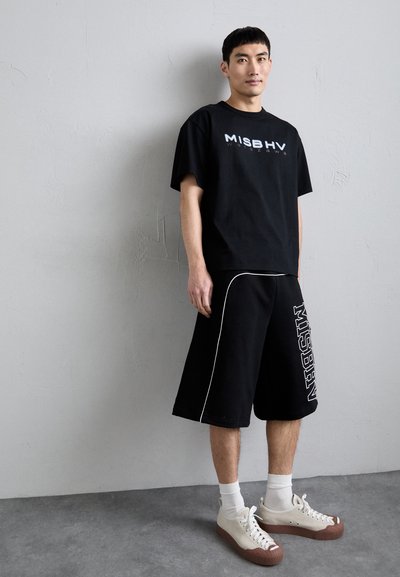 MISBHV SPRING BREAKERS - Pantaloni de trening - black