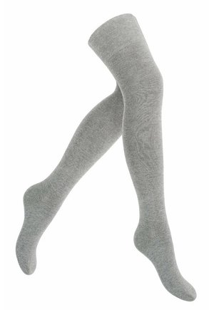 Chaussettes grises, opaques, montantes jusqu'aux genoux, avec une texture lisse et un léger côtelage en haut, présentant un design ajusté pour le confort.