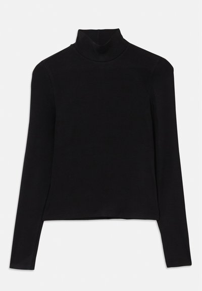 Svart polotröja med långa ärmar. Tillverkad av ett mjukt, stretchigt material. Enkelt design med en åtsittande silhuett och utan mönster.