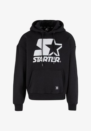 Schwarzer Kapuzenpullover mit einer Fronttasche und Kordelzug. Verfügt über ein großes weißes "STARTER"-Logo mit Stern-Design. Material aus Baumwollmischung.