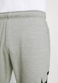 Nike Performance Pantalones deportivos - grey