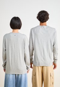 Salomon LOGO TEE UNISEX - T-shirt estampada - heather grey