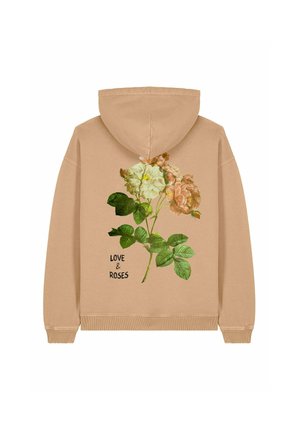 Haut à capuche beige avec un motif floral comportant des roses blanches et roses et des feuilles vertes. Texte "AMOUR & ROSES" imprimé en dessous des fleurs.