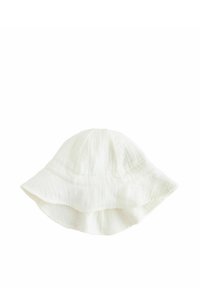 Chapeau seau en coton blanc avec un large bord évasé et une finition texturée et froissée. Conçu pour la protection solaire et pour un port décontracté.