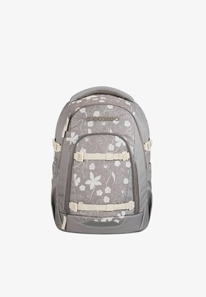 Gray backpack with white floral pattern, textured fabric, adjustable straps, and zippers. Includes two side pockets and a main compartment.