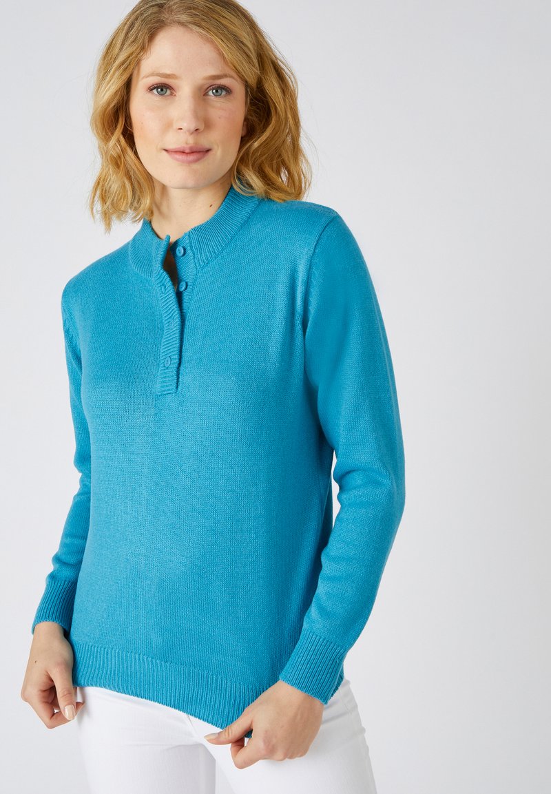 Pullover turchese a maglia con colletto arrotondato, patta con tre bottoni, polsini e orlo a costine. Texture morbida, silhouette slim.