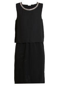 Robe noire sans manches avec un design en couches, présentant un col orné de perles et un tissu lisse. La jupe a une coupe légèrement ample.