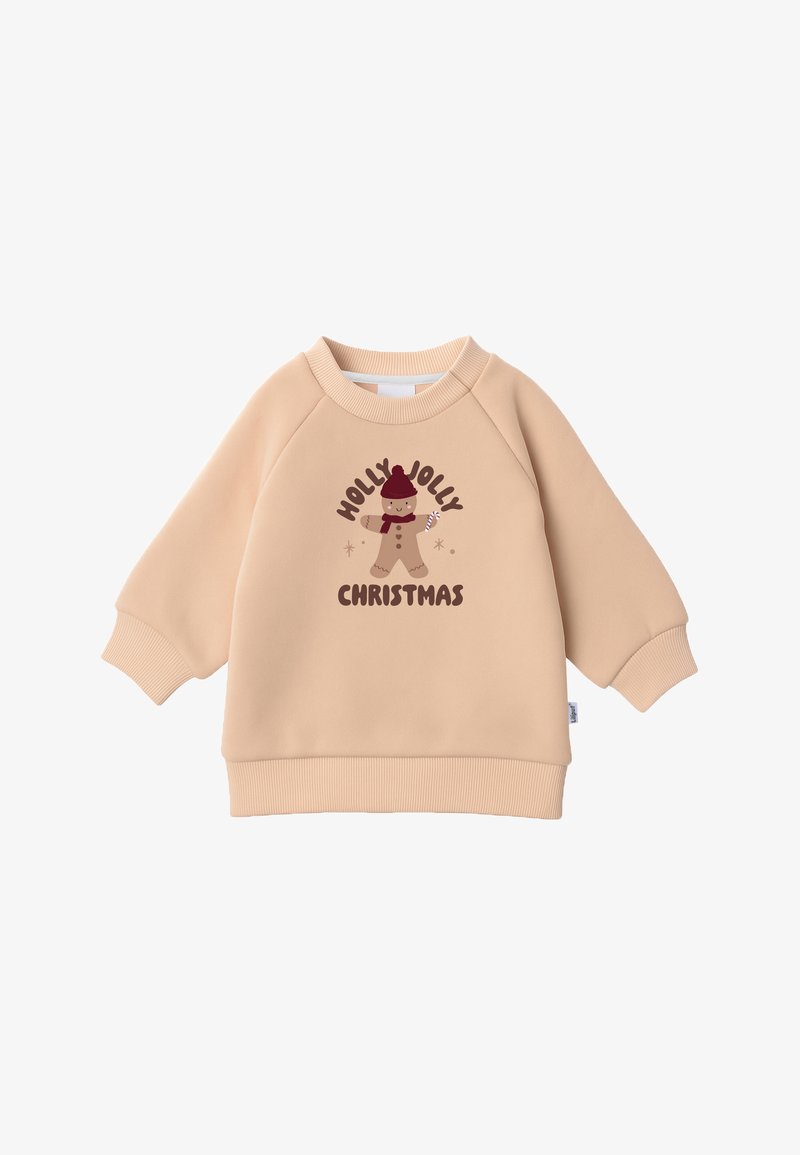 Beige sweatshirt with ribbed cuffs and hem. Features a graphic design of a gingerbread figure with "HOLLY JOLLY CHRISTMAS" text in brown.