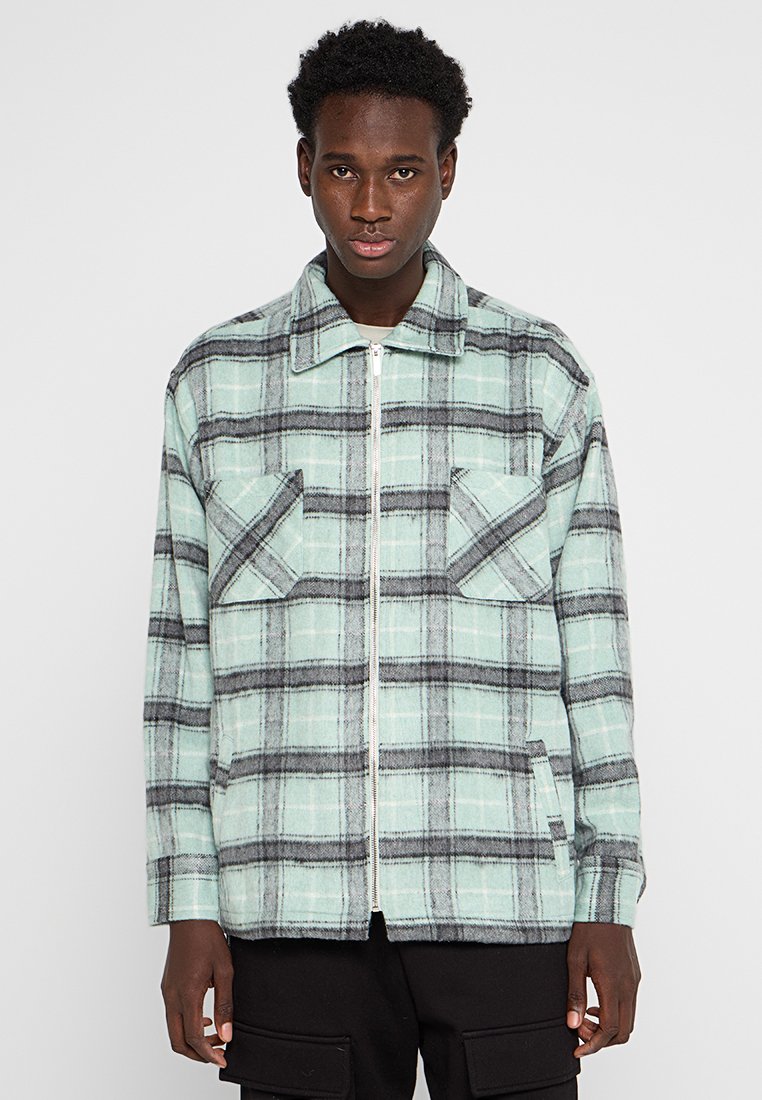 Pegador Lichte jas turquoise