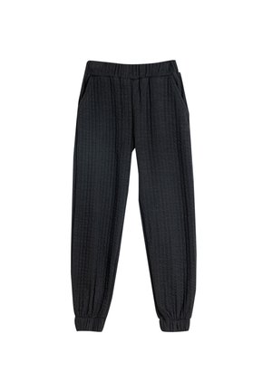 Sorte joggebukser med tekstureret stof, elastisk talje, sidelommer og elastiske manchetter ved anklerne.