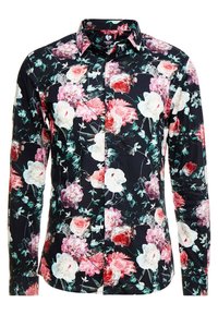 Svart långärmad skjorta med knappar, prydd med ett mönster av röda, rosa och vita blommor samt gröna blad. Skjortan har en krage och knäppta manschetter.