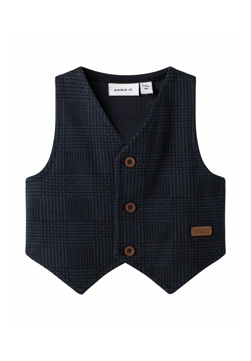 Marinefarbener karierter Weste aus strukturiertem Stoff, mit V-Ausschnitt, drei braunen Knöpfen und einem Lederetikett auf der unteren rechten Seite.