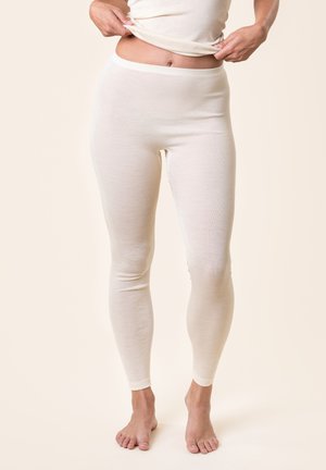 Cremefarbene, elastische Leggings aus weichem, leichtem Stoff mit glatter Textur und einem hohen, elastischen Bund. Petite Design, figurbetonte Form.