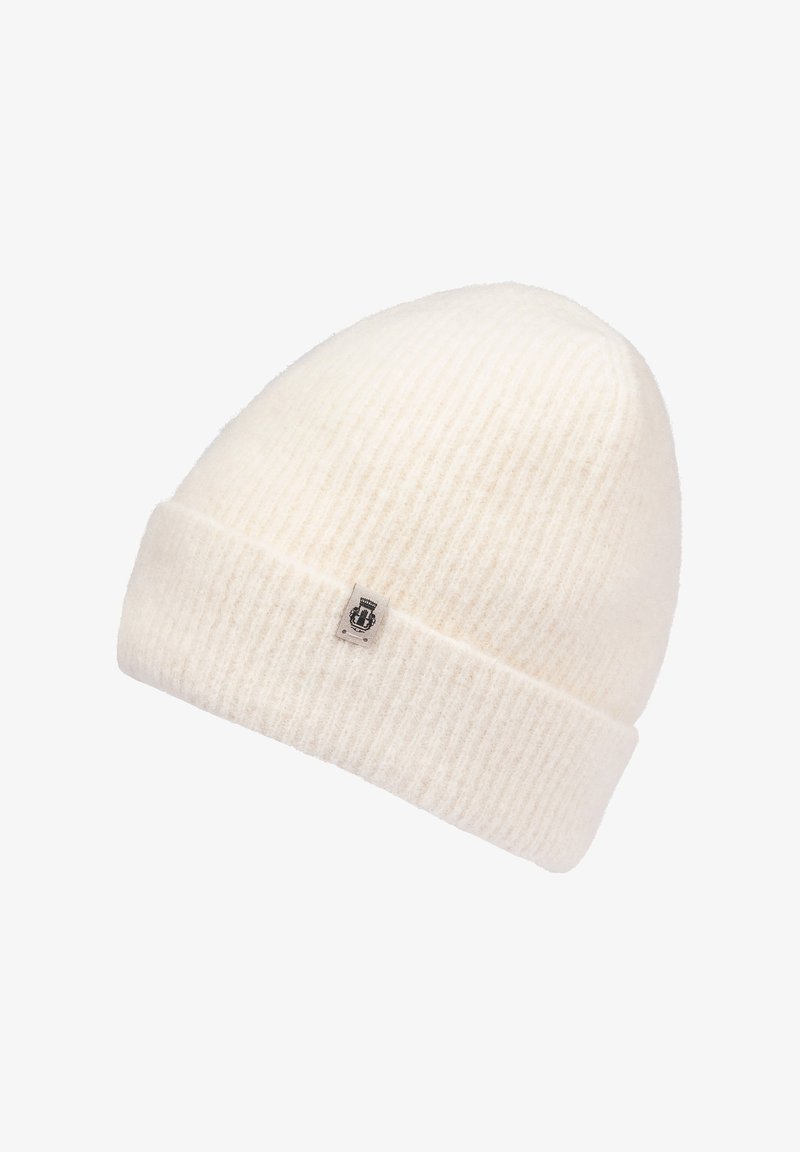 White wool beanie with ribbed texture, rounded top, and a folded brim. Includes a small logo tag on the front.