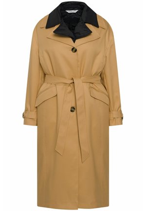 Beige trenchcoat met een zwarte kraag, knoopsluiting, tailleband en twee voorkennis. Glad stof met een gestructureerde silhouette.