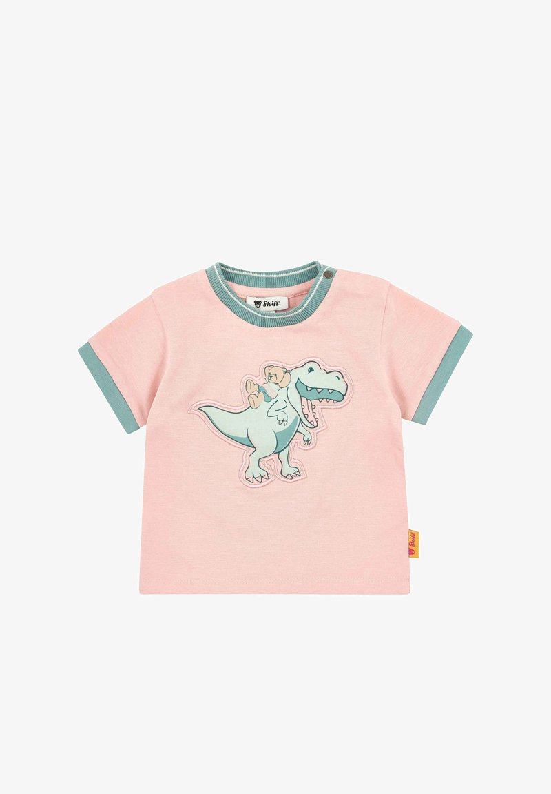 Camiseta rosa de manga corta con detalles en verde azulado y un divertido gráfico de dinosaurio en el frente. Cuenta con dos botones a presión en el cuello.